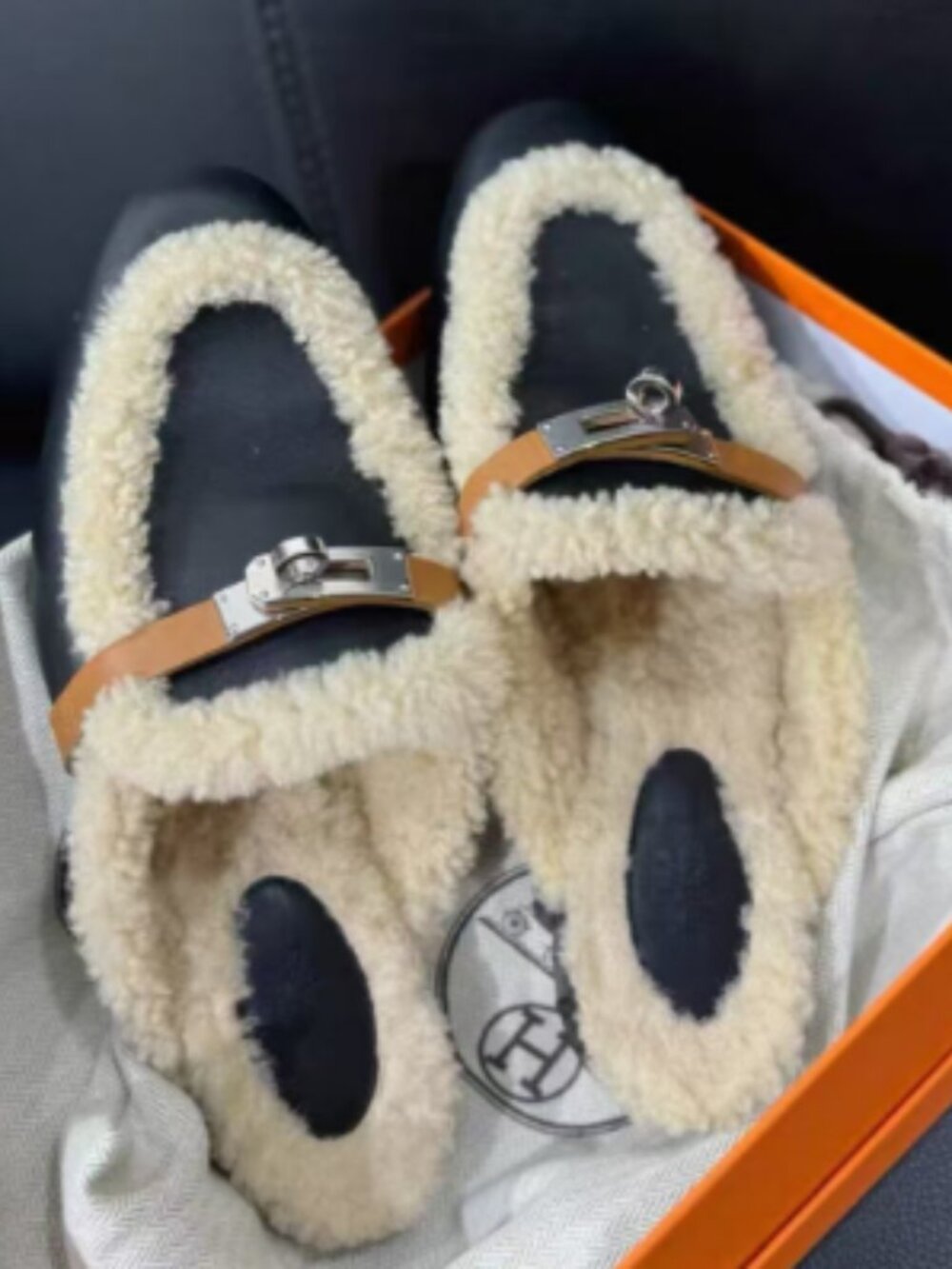 Hermès Black Leather Shearling Mules with Kelly Buckle